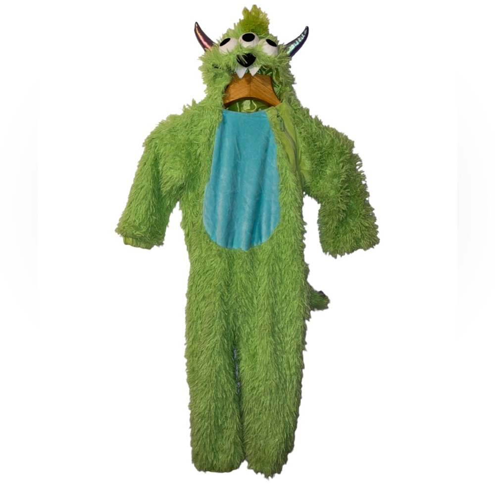 Green fuzzy three eyed Halloween monster costume